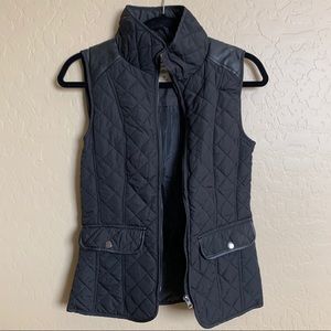 Black faux leather puffer vest